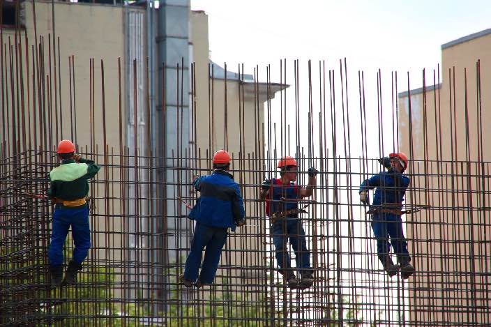 Image of steel workers