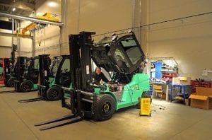 Image of forklift in workplace safety repair station